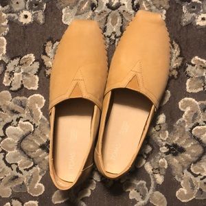 Tan suede TOMS.  Super soft worn once.